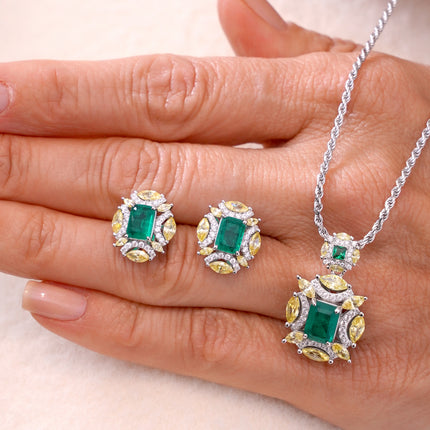 Emerald and fancy yellow earrings