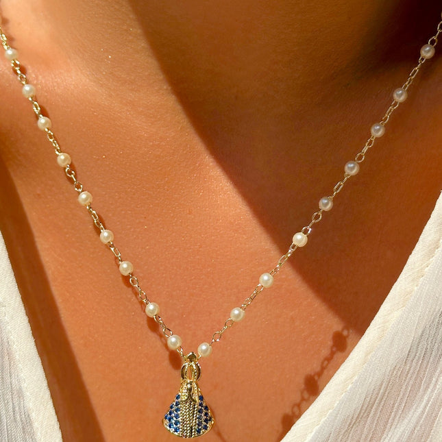 Scapular drop and zirconia mary
